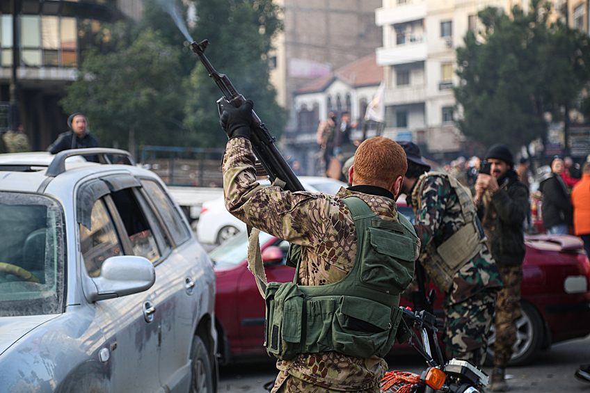 Сирийские повстанцы празнуют свержение Башара Асада