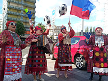 "Бурановские бабушки" устроили флешмоб в центре Москвы в поддержку сборной России