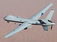 В РФ показали видео пролета Су-27 возле американского MQ-9