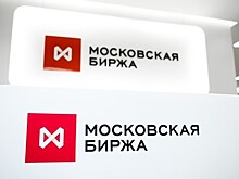 Рубль снизился к доллару и евро в начале торгов