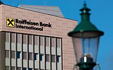 Raiffeisen Bank International купит долю Дерипаски в венской фирме Strabag