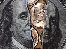 Доллар рухнул ниже 58 рублей