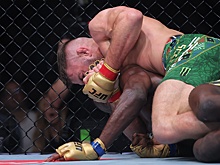 Дю Плесси защитил титул чемпиона UFC, задушив Адесанью