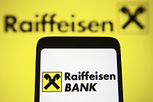 Reuters: США пытаются заставить Raiffeisen не покупать долю Дерипаски в Strabag