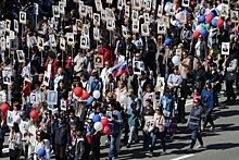 Сотни жителей Кузбасса прошли в День Победы в колоннах "Бессмертного полка"