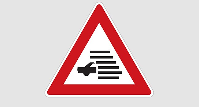 Необычные дорожные знаки в других странах — мигранты и жабы на дороге