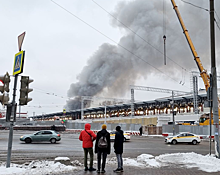 В тушению пожара в Москве привлекут поезд и авиацию