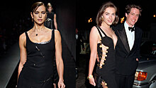 Ирина Шейк вышла на подиум Versace в платье с разрезами на булавках, как у Лиз Херли в 1994-м