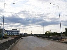 На дороге севернее «Лугометрии» уложили слой асфальта