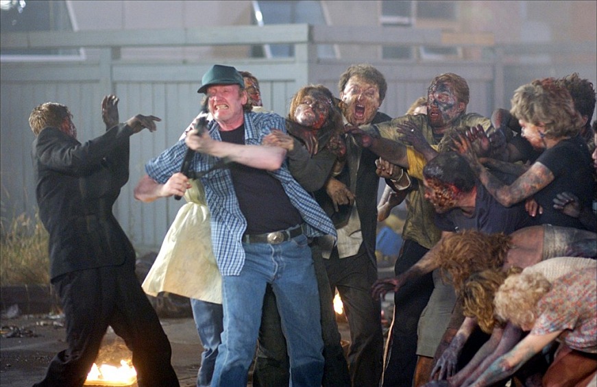 «Рассвет мертвецов» (2004) — фантастический фильм ужасов, снятый Заком Снайдером, ремейк одноимённого фильма 1978 года Джорджа Ромеро. В фильме описывается судьба группы людей после зомби-апокалипсиса, обороняющихся от орды «живых мертвецов» в забаррикадированном торговом центре.  