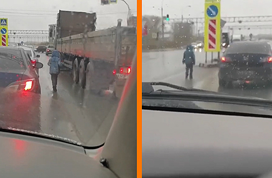 В Новосибирске на проезжей части ходит ребенок: он просит мелочь у водителей