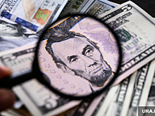 Аналитик: дефолт в России выгоден США и Великобритании