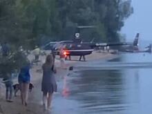 В Татарстане вертолёт приземлился на пляже с отдыхающими