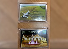 В Новосибирской области выпустили сувениры с севшим на поле самолётом