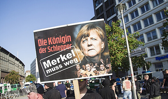 Беженцы рвут Меркель