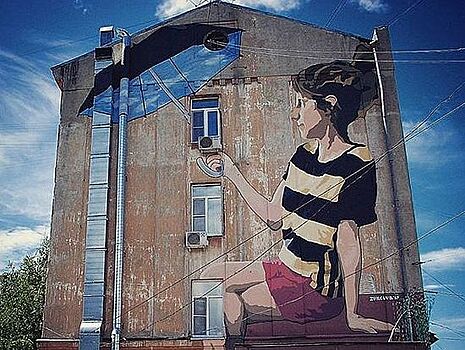 «Девочка с зонтиком» исчезла со стены дома в Нижегородском районе