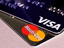 Visa и MasterCard накажут за Венесуэлу