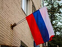 В Лобне развернули огромный российский флаг в виде буквы V