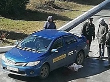 В Кемерове у онкодиспансера такси насмерть задавило песионерку