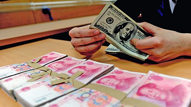 Банки Китая отказываются менять доллары гражданам с российскими паспортами