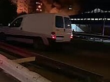 Появилось новое видео с места падения самолета на российский жилой дом