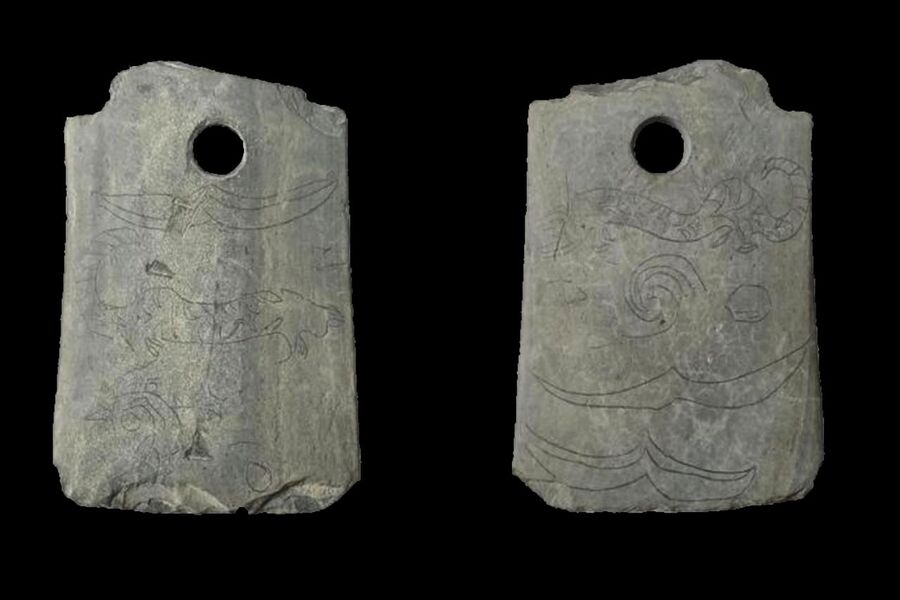 Археологи обнаружили в Китае древний ритуальный топор с выгравированными тиграми