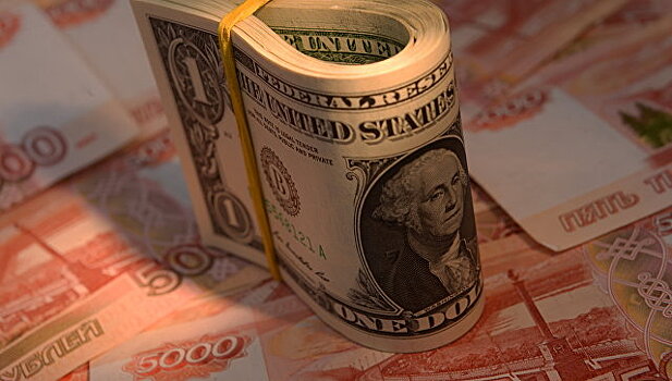 Курс доллара на открытии торгов опустился до 58,61 рубля