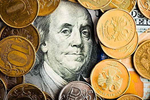 Банк России резко опустил курсы доллара и евро