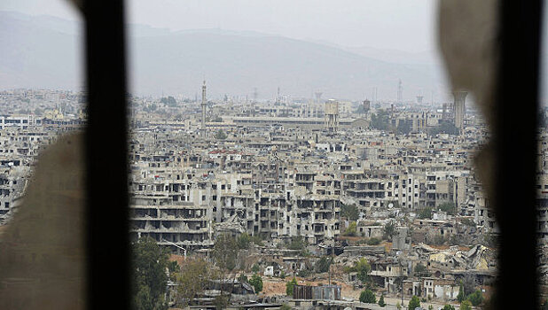 Общество Красного Полумесяца доставило гумпомощь в город Дума в Сирии