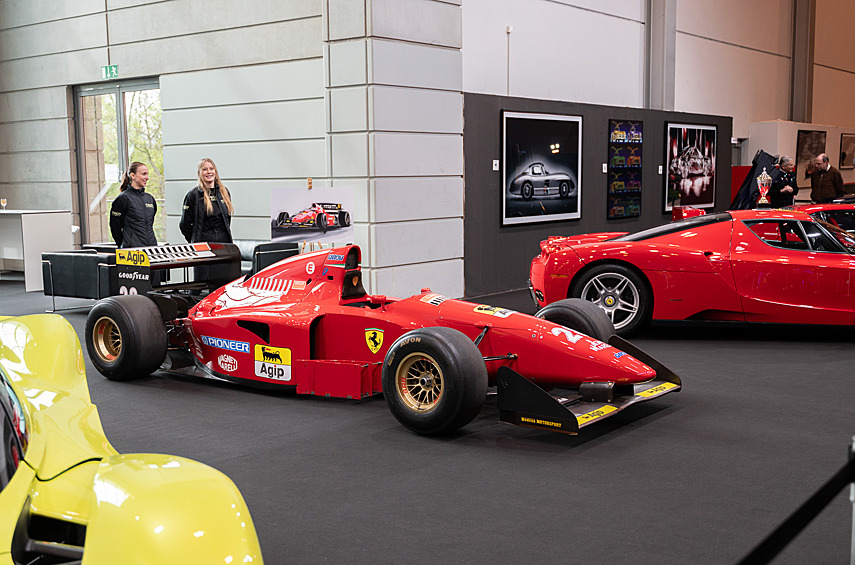 Болид Формулы-1 Ferrari 412 T1, на котором в сезоне-1994 выступали Герхард Бергер, Жан Алези и Никола Ларини. Удачная машина разработана под руководством Джона Барнарда, совершенно новый двигатель V12 3.5 с углом развала 75° проектировал бывший моторист Honda Осаму Гото. К концу сезона-1994 отдачу мотора довели до 850 л.с. при 15800 об/мин. Использовалась шестиступенчатая полуавтоматическая коробка передач с поперечным расположением валов в сварном картере из хром-молибденовой стали. На счету Бергера была одна победа на Гран-При Германии, три «серебра» и две «бронзы», у Алези — «серебро» и три бронзы, Ларини — одно «серебро». Сейчас машина находится в частной коллекции.