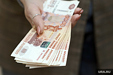 В Тюмени бизнесмен присвоил взятки, полученные от жены коррупционера из ЯНАО