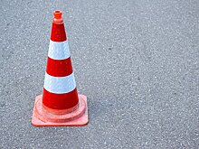 Во дворе на улице Цандера залатали яму