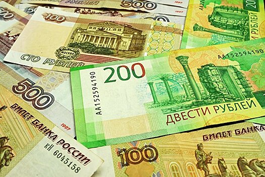 Рубль снижается к доллару и евро вместе с валютами развивающихся рынков
