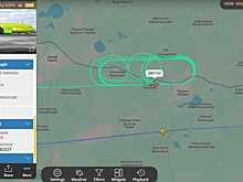 Авиалайнер S7 кружит над поселком Чулым после вылета из Толмачево