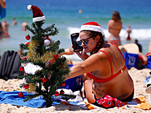 Новый год и Рождество по-австралийски: кенгуру вместо оленей и Санта на доске с веслом