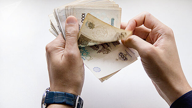 Народный банк Узбекистана начал зарабатывать на обналичивании денег