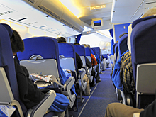 Назван фактор, повышающий риск заражения COVID-19 в самолете