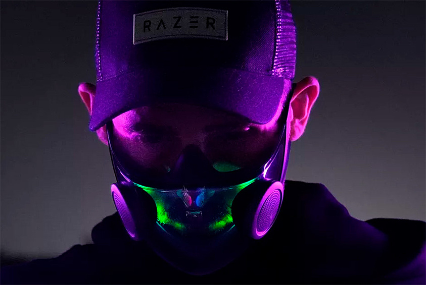 Защитная маска для геймеров. Какой гаджет для геймеров не имеет RGB-подсветки? То же самое подумали в Razer и выпустили маску Project Hazel. У нее три функции — защищать, удивлять и пугать. Во-первых, аксессуар закрывает нос и рот и имеет активные фильтры, которые очищают вдыхаемый воздух. Во-вторых, в маску встроены светодиоды, цвет, интенсивность и скорость потока которых можно регулировать через приложение. В-третьих, в Project Hazel зачем-то добавили динамики, усиливающие громкость голоса.  