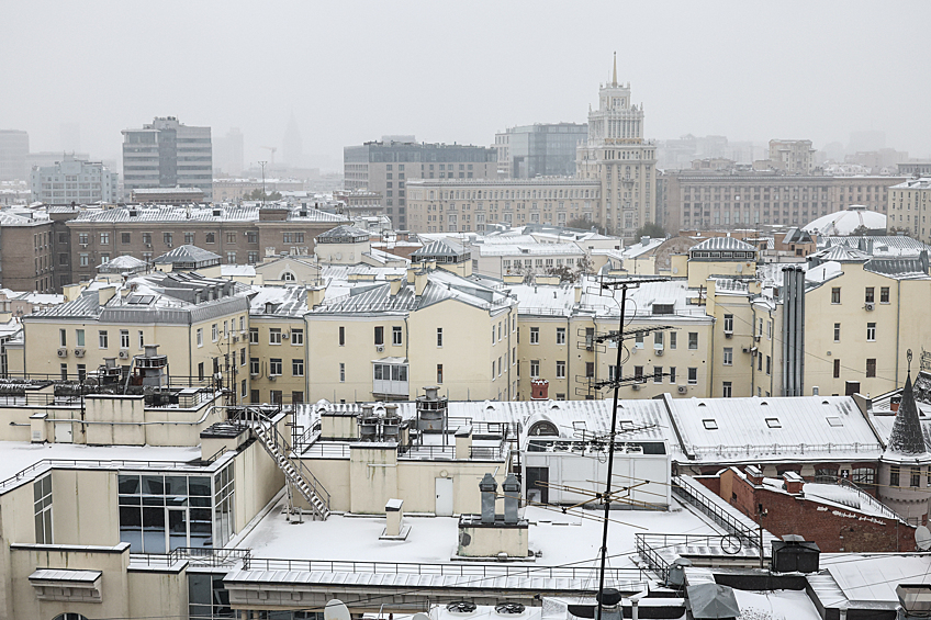 Вид на город во время снегопада