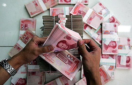 Народный банк Китая ослабил курс юаня до минимального уровня