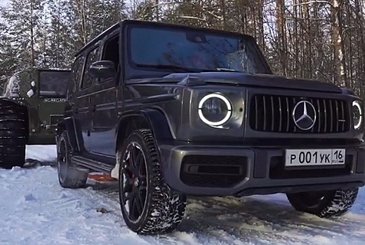 Видео: Mercedes-AMG G 63 перетягивает канат с вездеходом «Шерп»