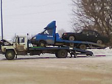 Эвакуатор эвакуировал эвакуатор с эвакуированным авто