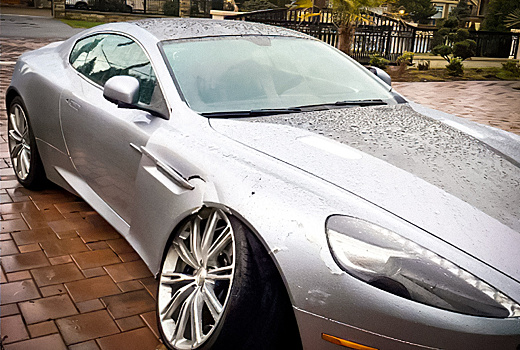 Владелица Aston Martin хотела отсудить у дилера деньги за ремонт, а в итоге осталась должна ему