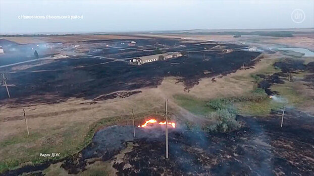 Последствия пожара на складах боеприпасов под Мариуполем сняли с БПЛА