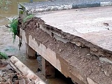 Ливневые дожди разрушили мост через реку Уза в Порховском районе