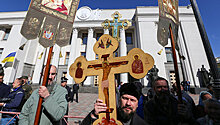 "Верующие возьмутся за ножи": католики Украины боятся потерять свои храмы