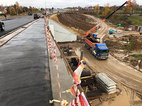 На строящемся мосту через р. Копнинку в Сергиевом-Посаде уложили асфальт