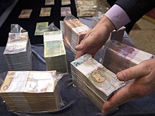 Выгодно ли Беларуси и России введение единой валюты?