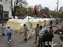 Спустя четыре года в Киеве снова начались беспорядки и горят шины