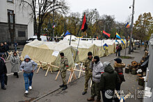 Спустя четыре года в Киеве снова начались беспорядки и горят шины